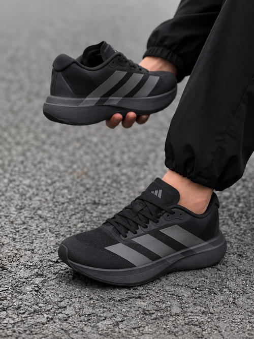Black Adidas running shoes