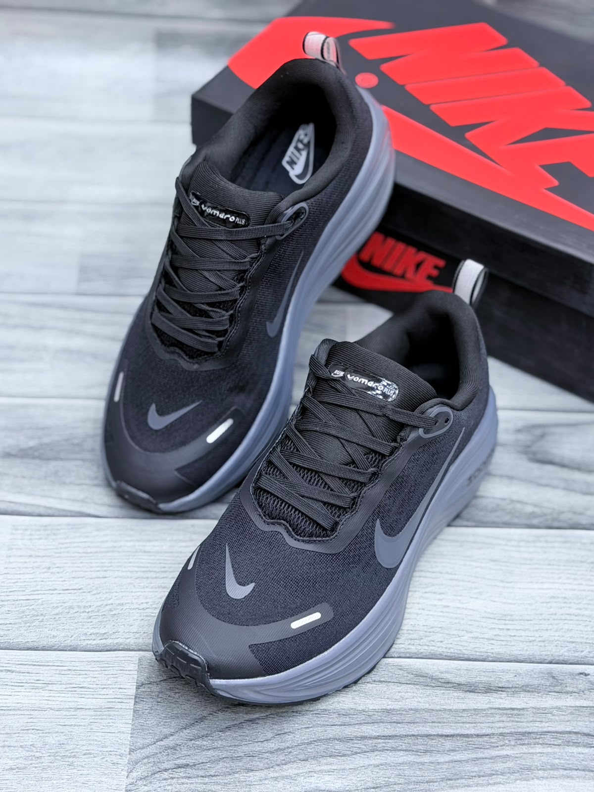 Nike Vomero 18 Plus Running Shoes`
