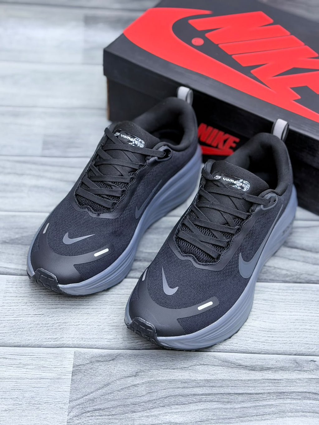 Nike Vomero 18 Plus Running Shoes`
