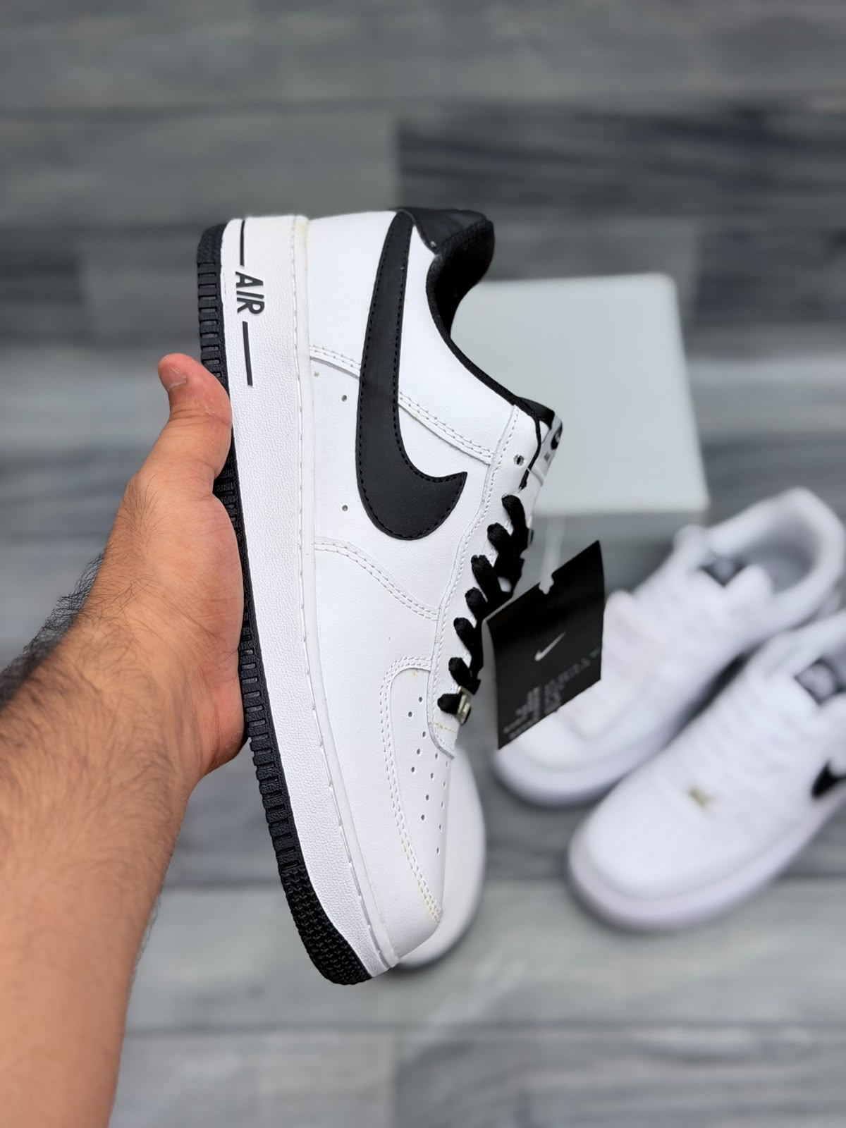 Nike Air Force 1 White Black men’s sneakers with black laces and outsole