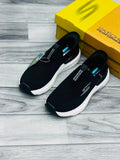 Black and white Skechers Hyper Burst women's slip-on sneakers with Memory Foam tag