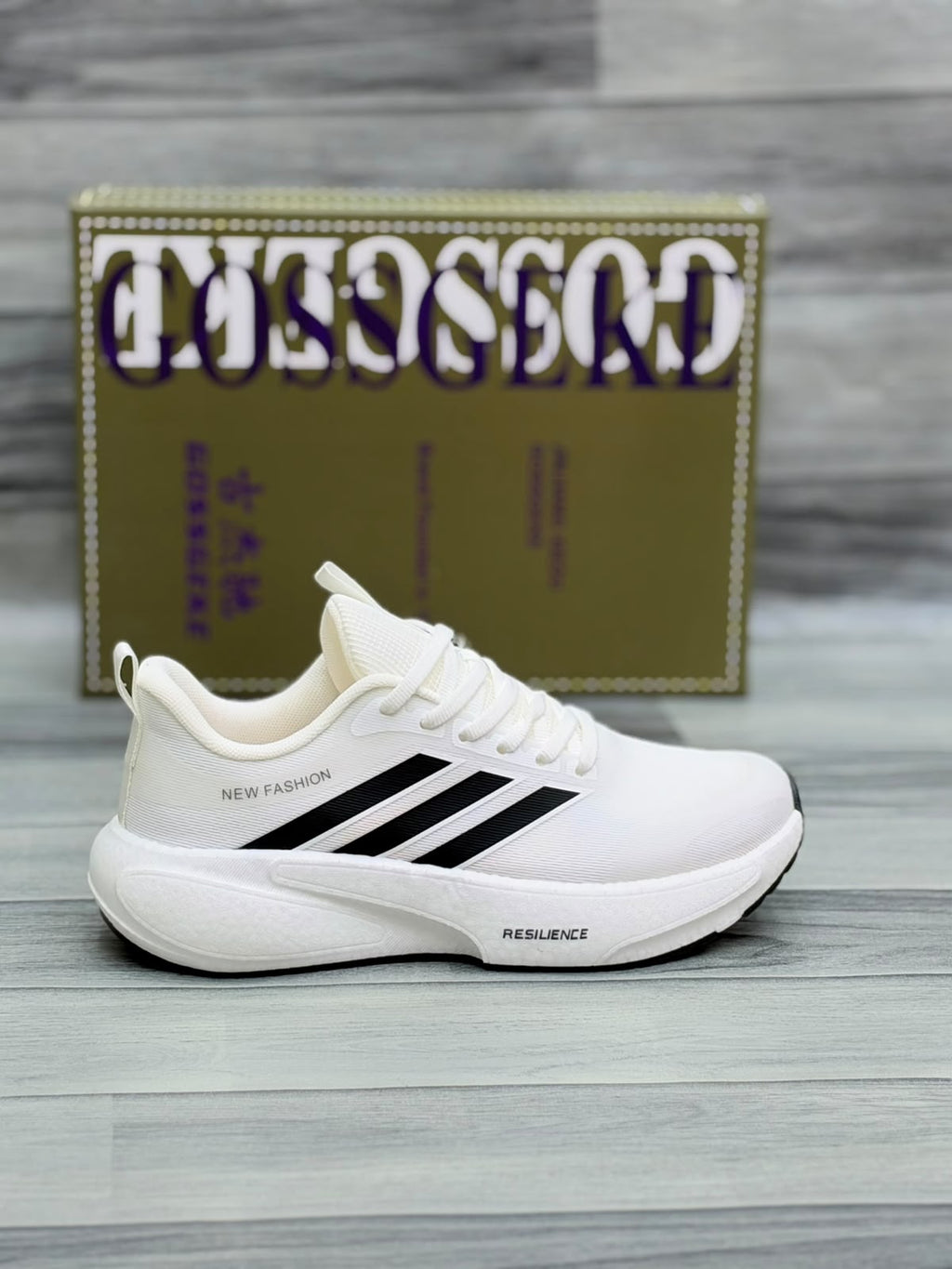 White Gossgeke chunky sneakers with black stripes and cushioned sole, front view